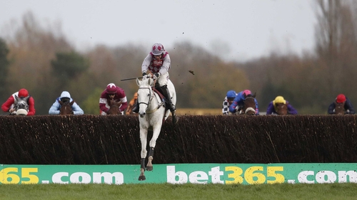 Smad Place leaves his rivals toiling in his wake as he clears the last at Newbury