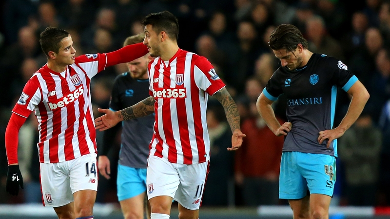 Ibrahim Afellay celebrates his goal with Joselu