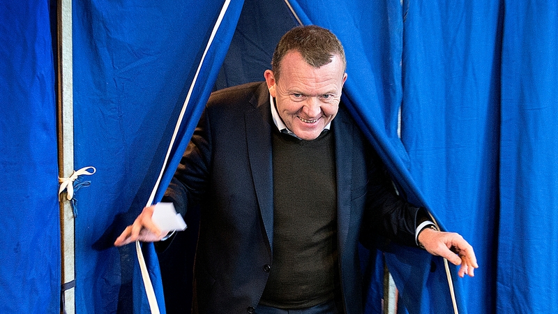 Danish Prime Minister Lars Lokke Rasmussen leaving the voting booth at Nyboder School in Copenhagen this morning