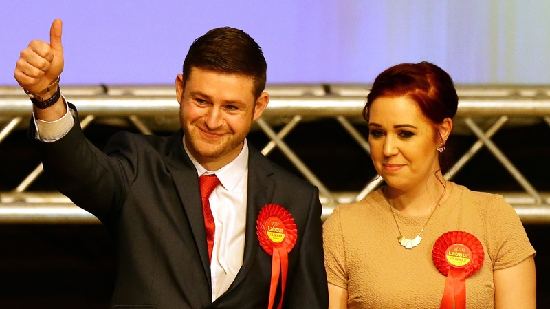 Labour candidate Jim McMahon with his partner Charlene celebrates victory