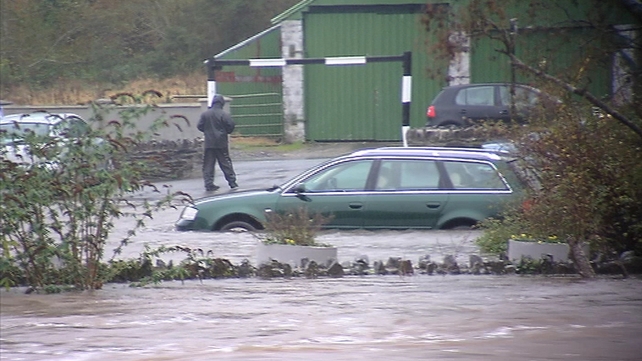 A man makes his way through the water