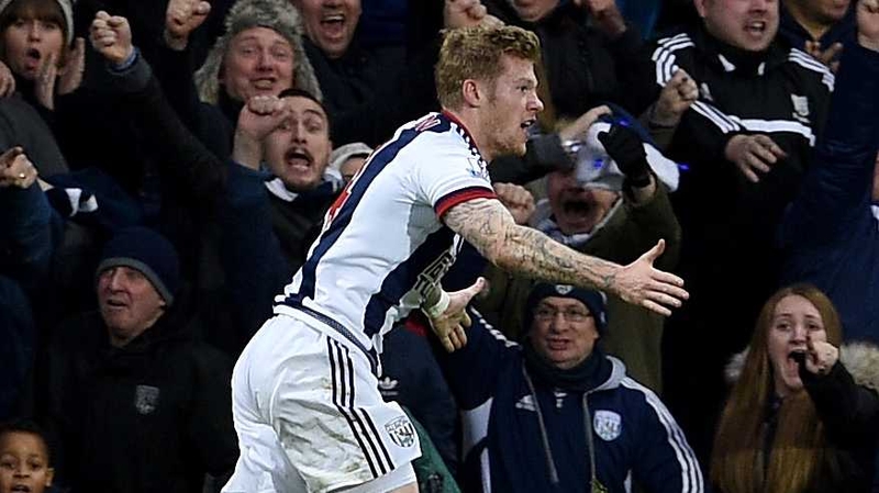 James McClean celebrates his eualising goal against Tottenham