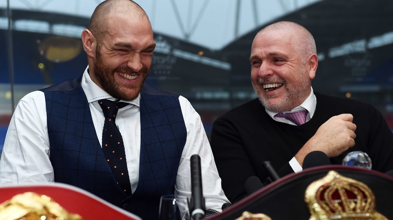 Tyson Fury (L) with his uncle and trainer Peter Fury
