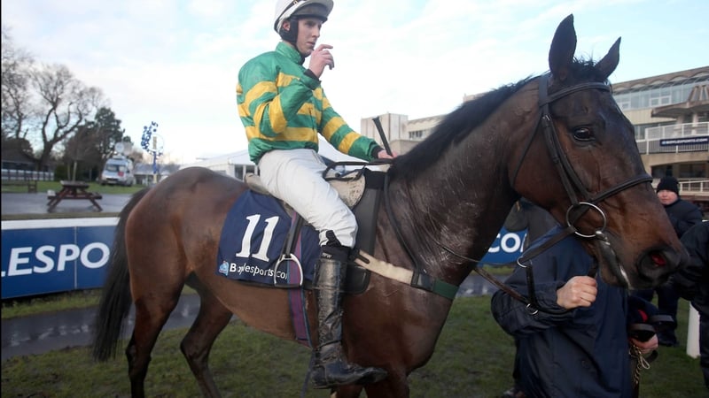 Mark Walsh and Gilgamboa after winning the Boylesports.com Hurdle at Punchestown in January 2014