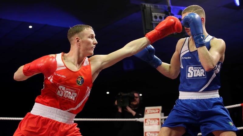 Michael O’Reilly (red) becomes the eight Irish boxer to secure Olympic qualification