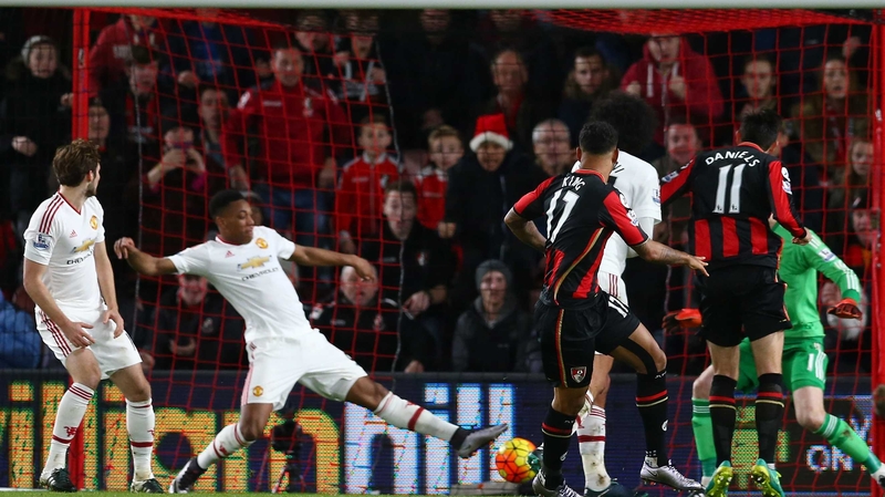 Joshua King slides home the winning goal