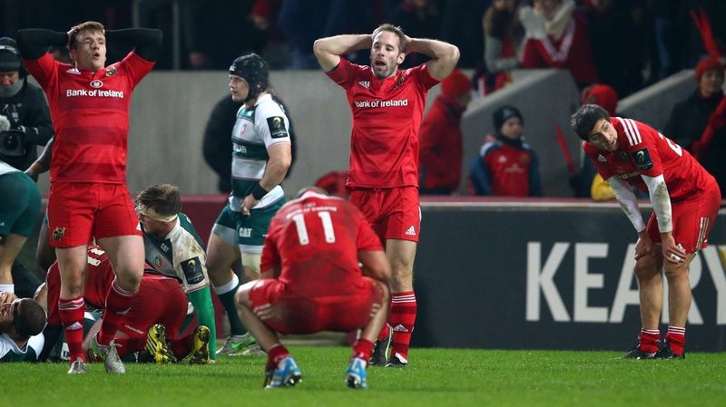 Dejected Munster players after the final whistle at Thomond Park