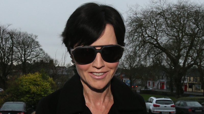 Dolores O'Riordan pleaded guilty to headbutting and spitting on a police officer