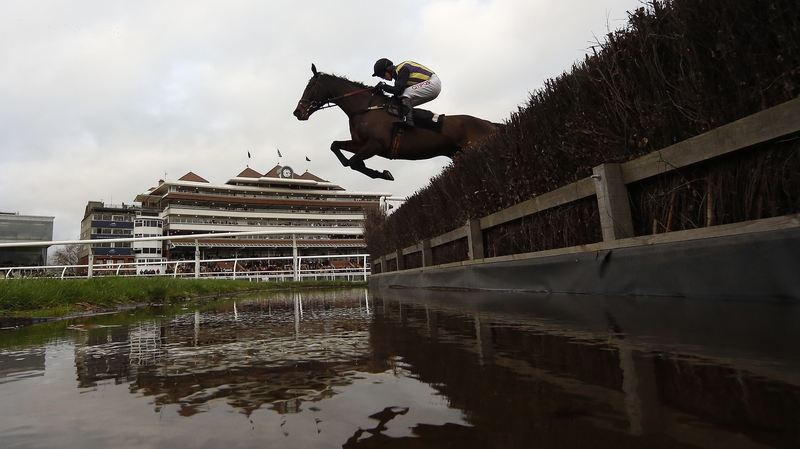 Noel Fehily and O'Faolains Boy clear the water on their way to victory-