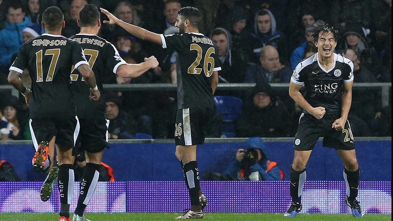 Shinji Okazaki (far right) celebrates scoring Leicester's third goal against Everton