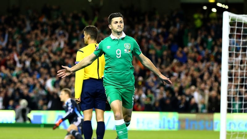 Shane Long celebrates scoring against Germany