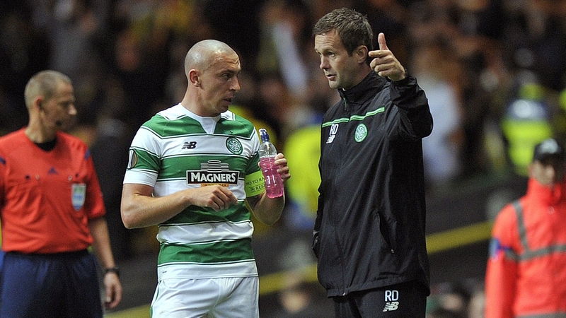 Scott Brown confers with Ronny Deila during their Europa League draw with Fenerbahce in October