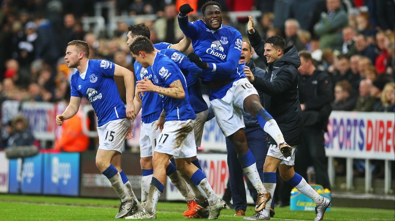 Everton players celebrate Tom Cleverley's dramatic 93rd-minute headed goal