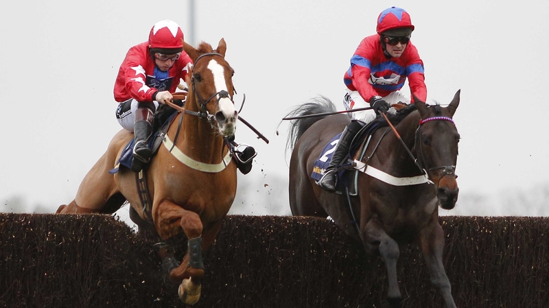 Nico de Boinville on Sprinter Sacre (right) clears the last alongside Sire De Grugy and Jamie Moore en route to winning the Desert Orchid Chase at Kempton Park