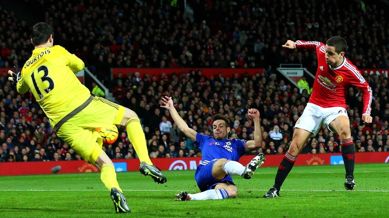 Ander Herrera sees his effort saved by Thibaut Cortois