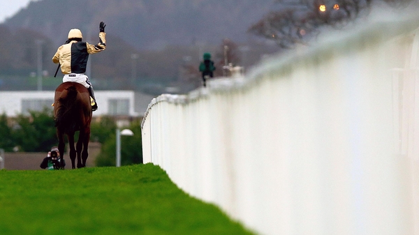 Ruby Walsh salutes the main stand after winning the race on Nichols Canyon