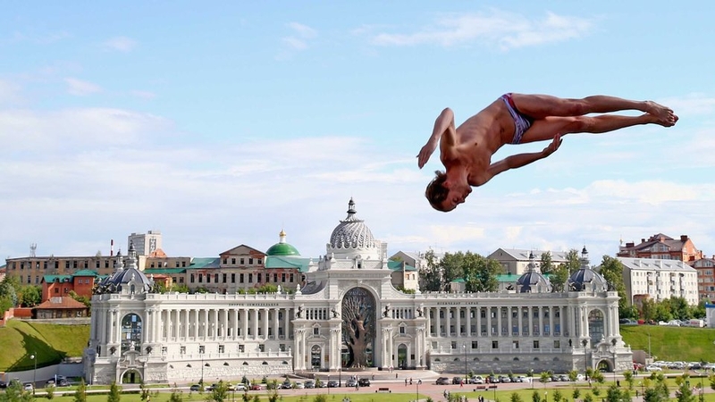 Carlos Gimeno of Spain competes in the Men's High Diving 27m preliminary round at the 16th FINA World Championships in Russia