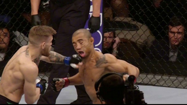 Conor McGregor knocks out Jose Aldo just 13 seconds into their UFC Featherweight title fight in Las Vegas