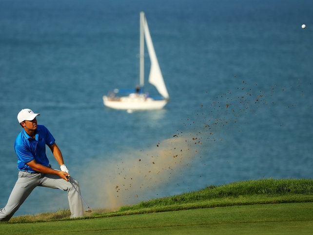 Jordan Spieth plays a bunker shot on the 16th hole during the final round of the 2015 PGA Championship at Whistling Straits