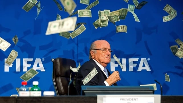 Comedian Simon Brodkin threw dollar bills at FIFA President Sepp Blatter at a press conference in Zurich, Switzerland