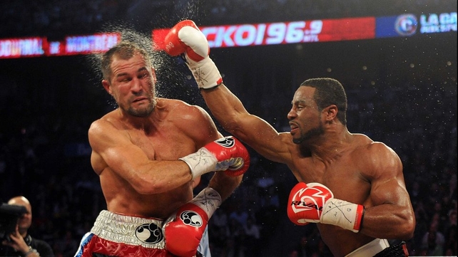 Sergey Kovalev recoils after Jean Pascal connects with a 
thundering right during their light heavyweight championship unification bout in Montreal