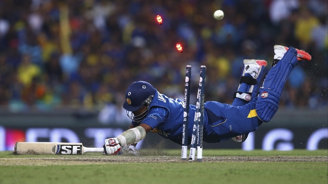 Mahela Jayawardene of Sri Lanka is run out by Australia's Michael Clarke during the 2015 ICC Cricket World Cup