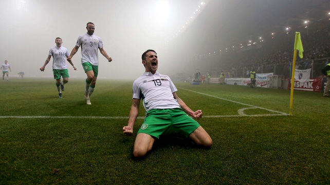 Ireland's Robbie Brady celebrates scoring against Bosnia in a foggy first-leg Euro 2016 play-off in Zenica