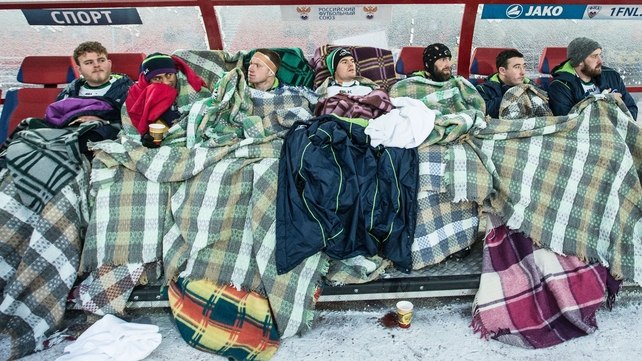 Connacht players wrap up warm as they watch their team take on Enisei-STM in the Challenge Cup in Siberia