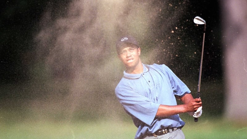 Tiger Woods chips out of the sand trap during the 1999 PGA Championships at the Medinah Country Club