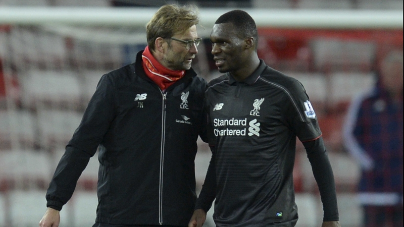 Liverpool supremo Jurgen Klopp talks with Christian Benteke after the full-time whistle at the Stadium of Light