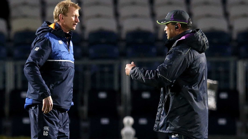 Leinster coach Leo Cullen talks to his opposite number Pat Lam before the game