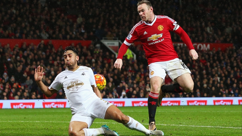 Wayne Rooney backheels the winner