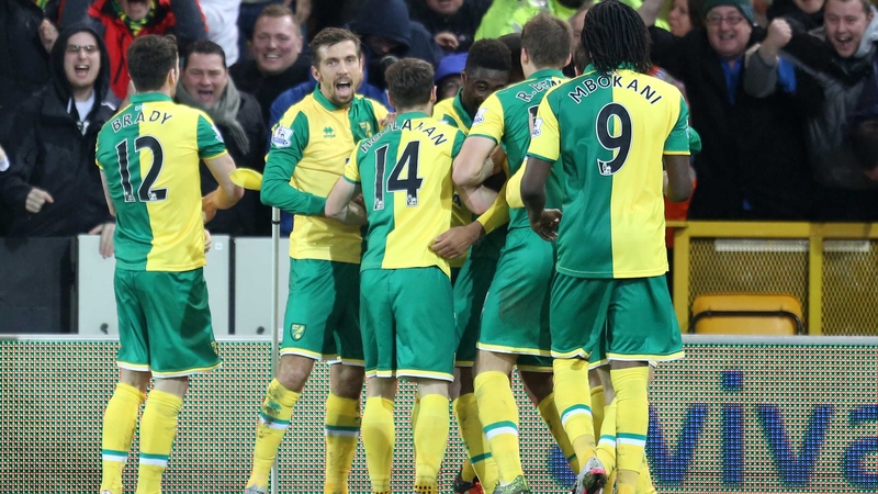 Norwich players celebrate Alex Tettey's goal