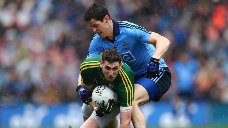 Paul Geaney of Kerry battles with Rory O'Carroll