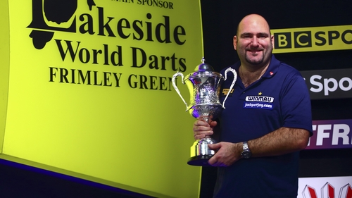 Scott Waites of England with his winning trophy