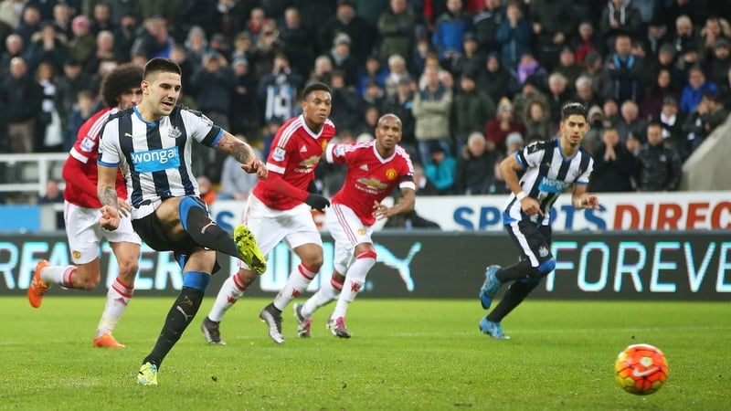 Aleksandar Mitrovic scores from the penalty spot for Newcastle