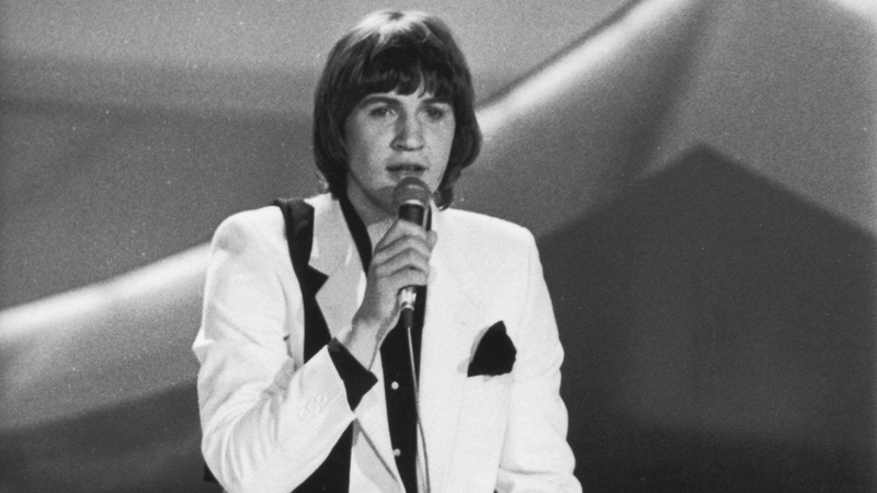 Johnny Logan in his bright white suit