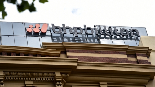 Global miner BPH Billiton reports its first loss in more than 16 years