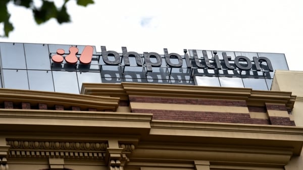 Global miner BPH Billiton reports its first loss in more than 16 years