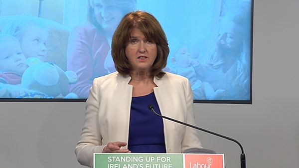 Joan Burton Fianna Fáil leader Michael Martin has a "brass neck" for 'trying to claim the credit for the recovery'