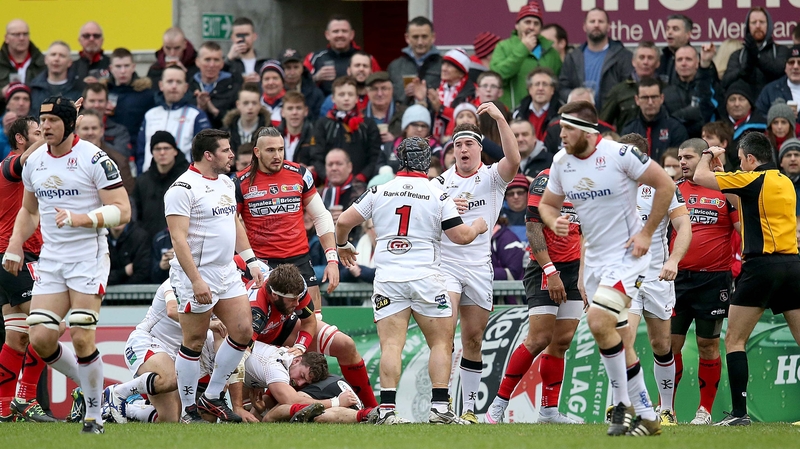 Ulster players celebrate Rob Herrings try