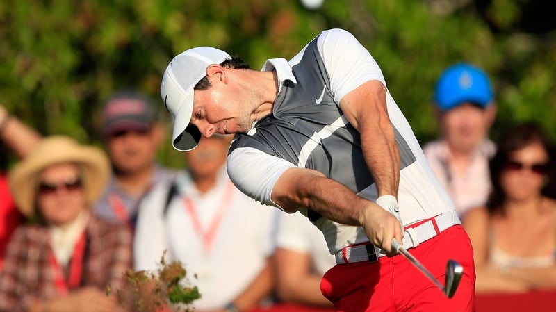 Rory McIlroy share the lead