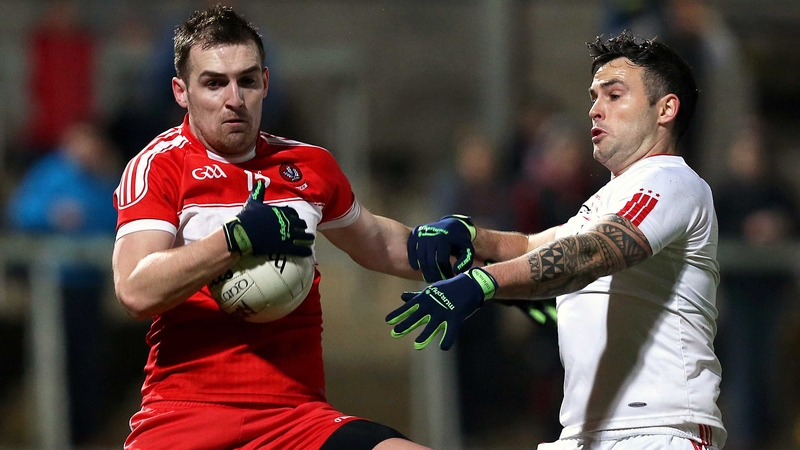 Derry's Ryan Bell and Cathal McCarron of Tyrone