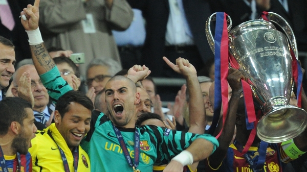 Victor Valdes celebrates Champions League victory against United in 2011