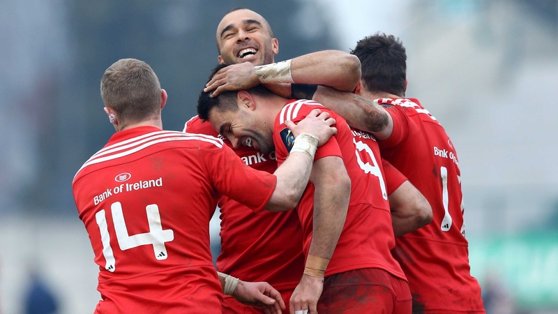 Conor Murray is mobbed following his try