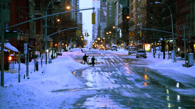 The snow melting on the streets of New York City