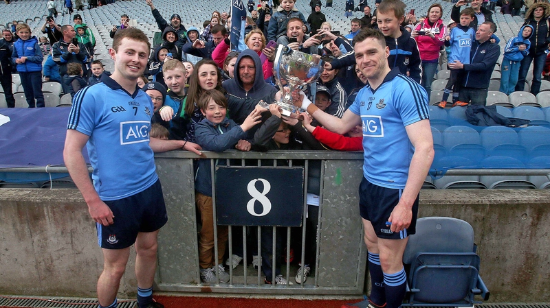 Dublin's Jack McCaffrey and Paddy Andrews celebrate with supporters after winning the Division 1 crown in 2015
