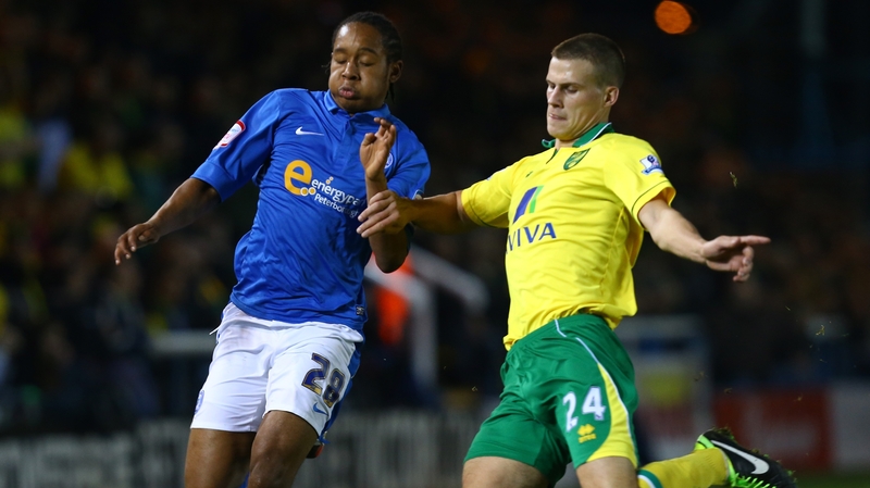 Jaanai Gordon (left) in action for Peterborough ahead of his move to Upton Park