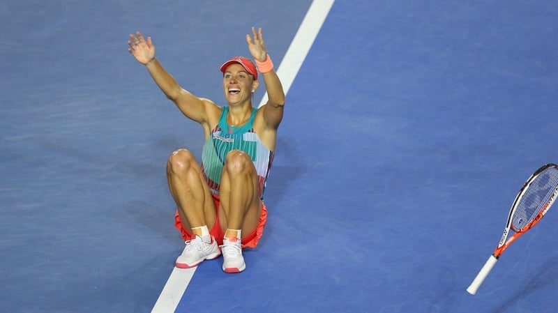 Angelique Kerber drops to the floor after winning the Australian Open in Melbourne