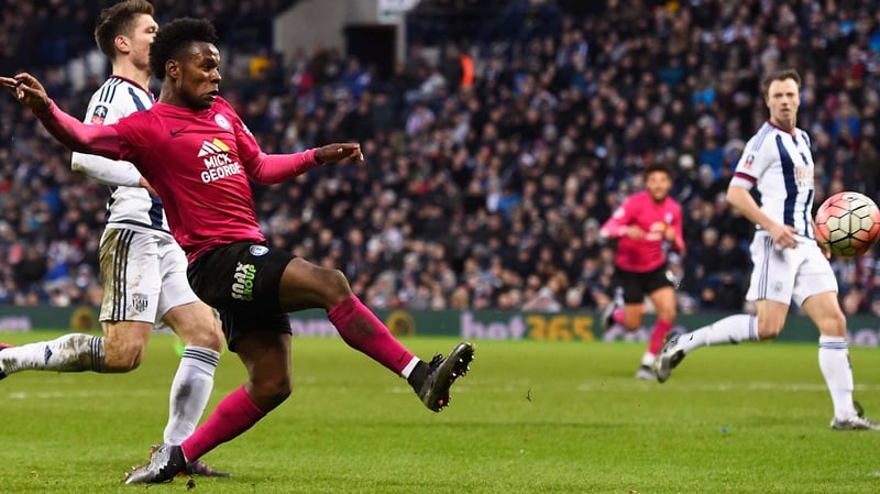Shaquile Coulthirst guides home Peterborough's first goal